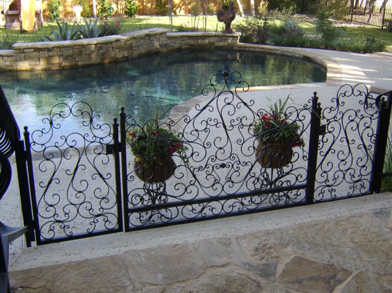 iron pool gates with fencing - weaver creative - evans weaver